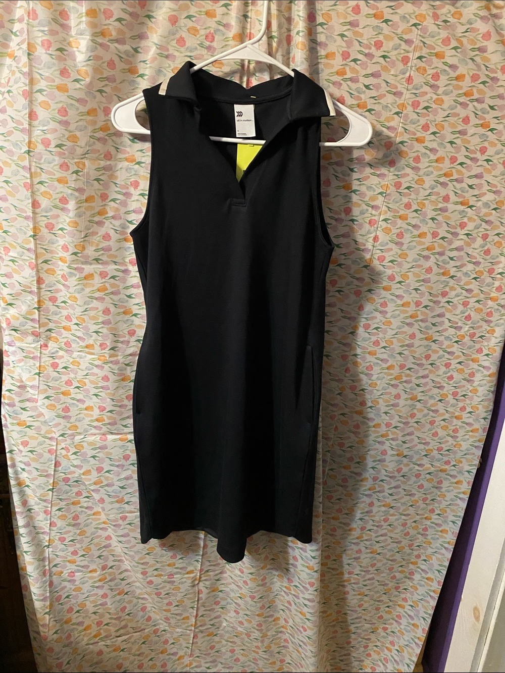 Classic Black Sleeveless Polo Dress with White Collar Trim